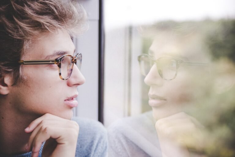 Thoughtful person reflecting, illustrating affective forecasting and predictions about future emotions