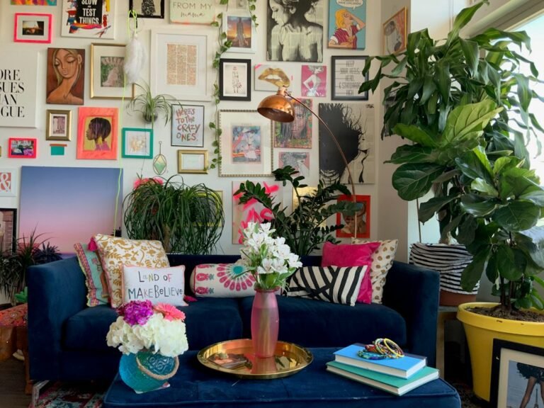 Eclectic living room with a colorful gallery wall and collected personal objects