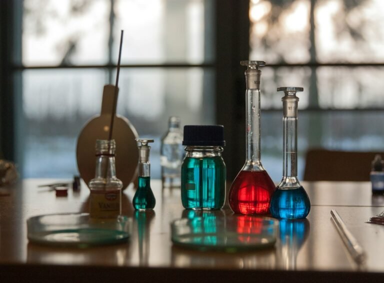 Laboratory glassware with liquids illustrating deep eutectic solvents and greener chemistry