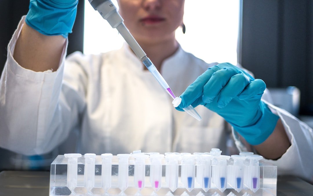 Scientist conducting molecular biology research in a laboratory for an article about mirror life