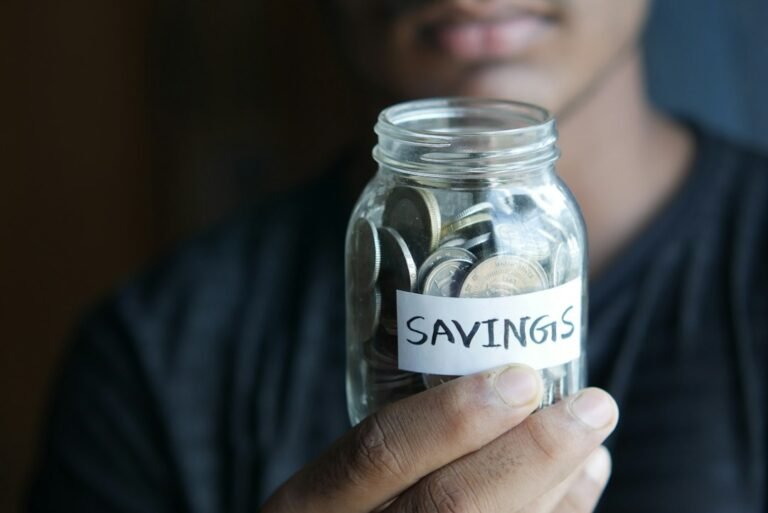 Savings jar representing sinking funds and emergency funds