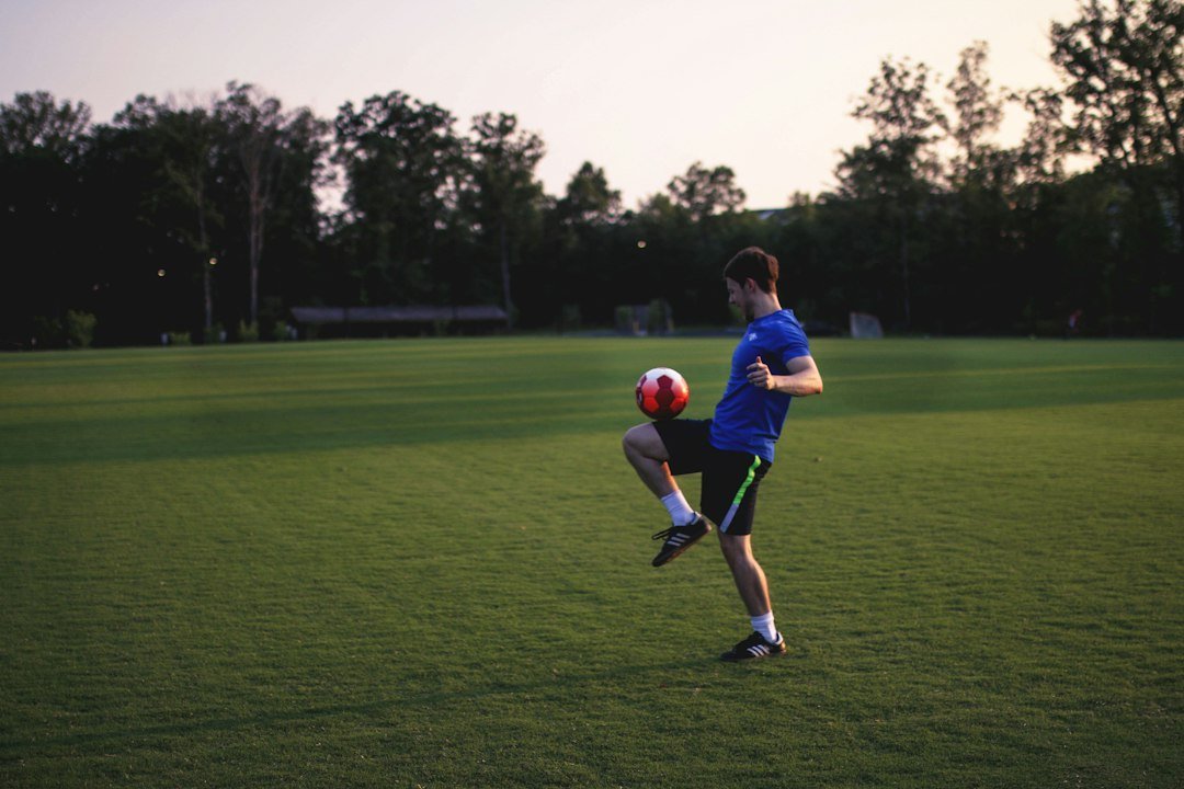 Football skill training with a soccer ball, illustrating the ball control used in teqball
