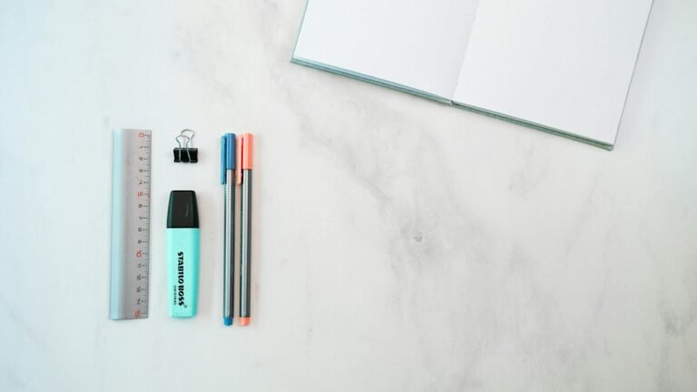 Notebook, ruler and pencil arranged on a desk for King Henry metric conversion practice