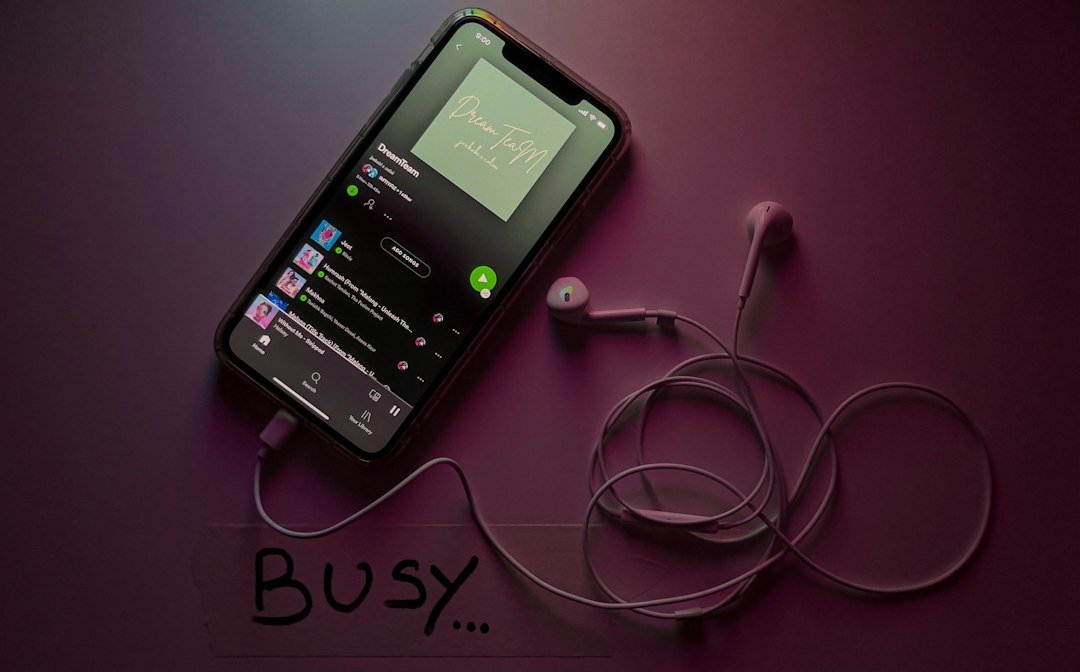 Smartphone used for music streaming, illustrating music discovery through recommendation algorithms